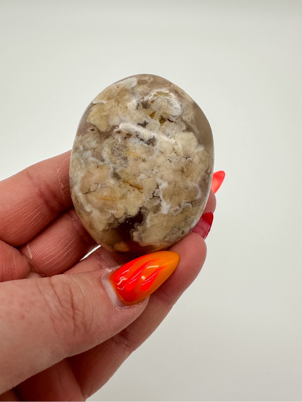 Polished Beige and Cream Agate Palm Stone